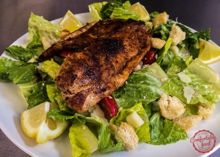 Homemade Caesar salad recipe with blackened tilapia.