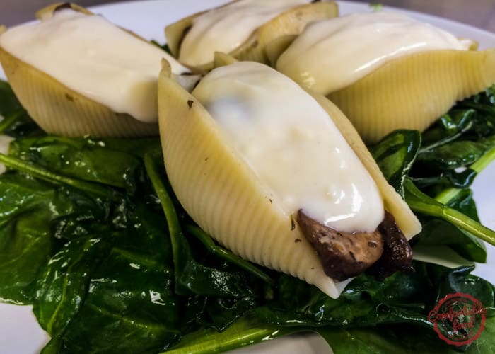 Jumbo Stuffed Shells With Mushrooms And Smoked Gouda Sauce 5 A recipe for rich and creamy vegetarian stuffed shells.