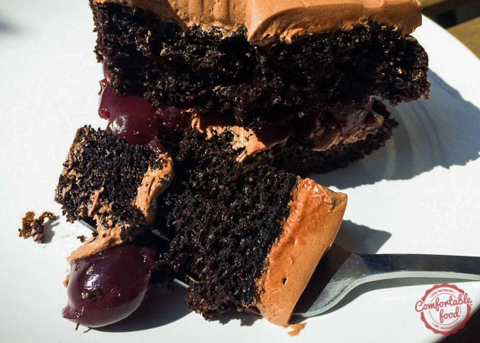 Chocolate Cake With Cherry Filling And Chocolate Buttercream Frosting 1 Cherry chocolate cake with buttercream icing.