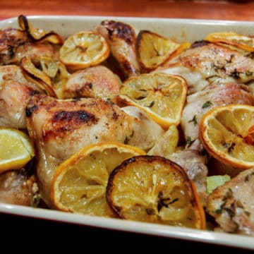 A simple recipe for roasting chicken with lemon and vegetables.