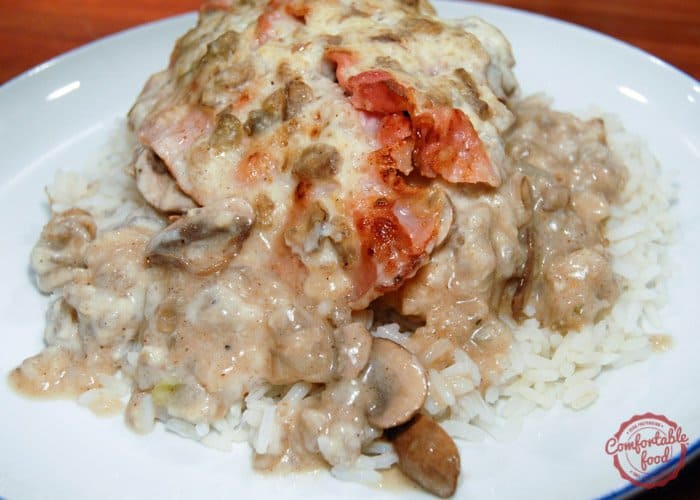 Succulent chicken breasts smothered with mushrooms and bacon.