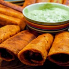Crispy chicken flautas - the perfect party food.