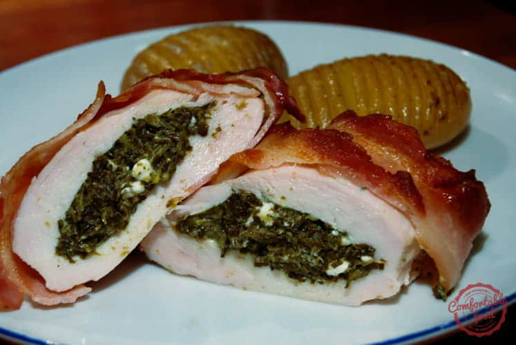 Stuffed chicken breasts wrapped in bacon.