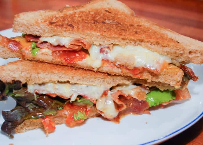 Grilled cheese with bacon, lettuce and tomato.