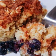 A rich dense Coffee Cake with sour cream and blueberries.