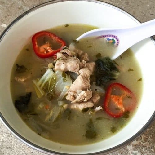 Thai coconut chicken soup with fresh herbs and chili