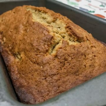 Cream Cheese Banana Bread 3 Fresh loaf of cream cheese banana nut bread in bread ban.