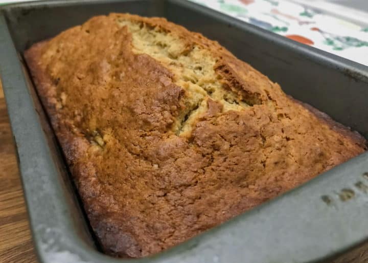 Cream Cheese Banana Bread 2 Fresh loaf of cream cheese banana nut bread in bread ban.