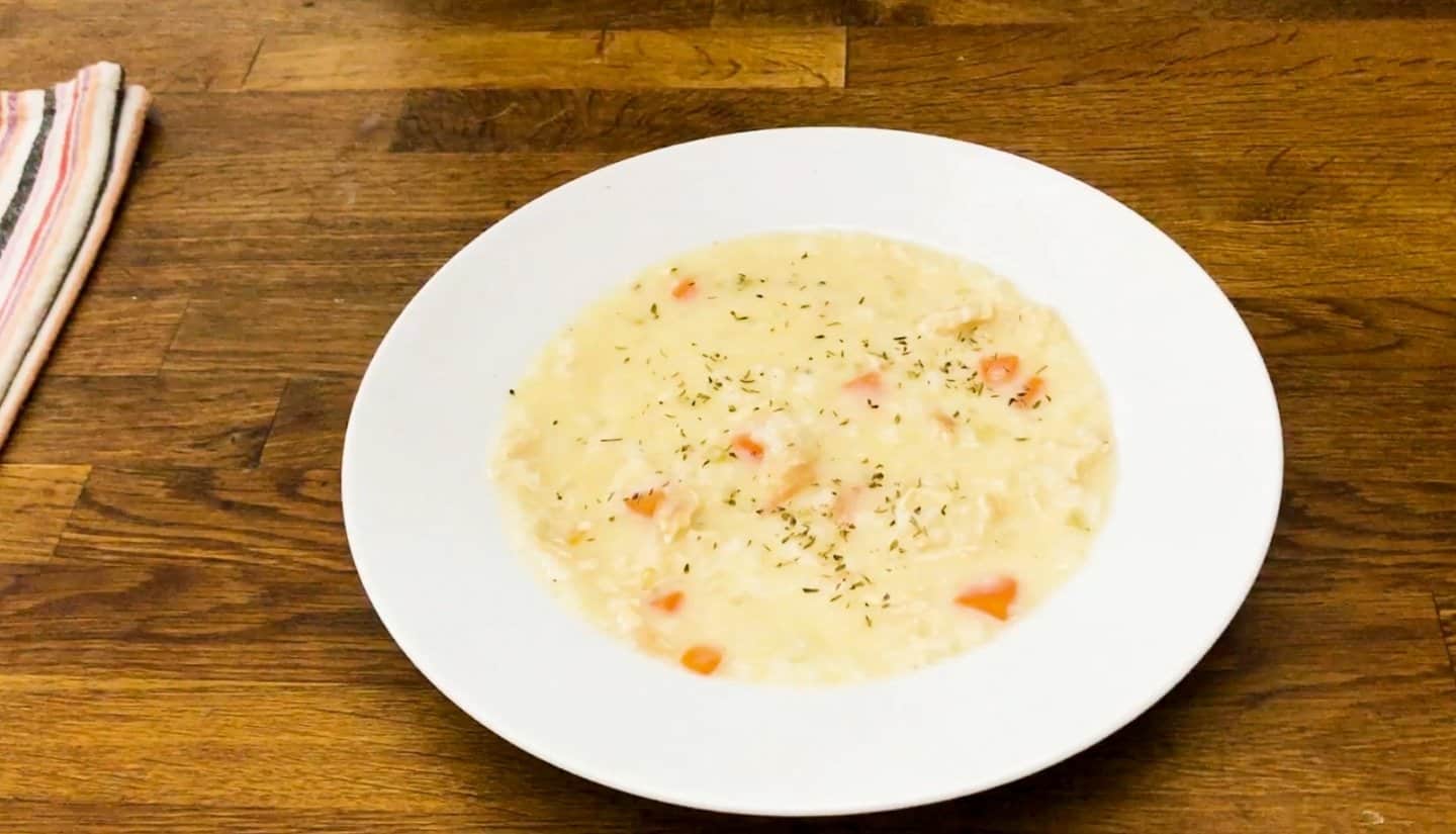 Greek Lemon Chicken Soup serve in a white plate