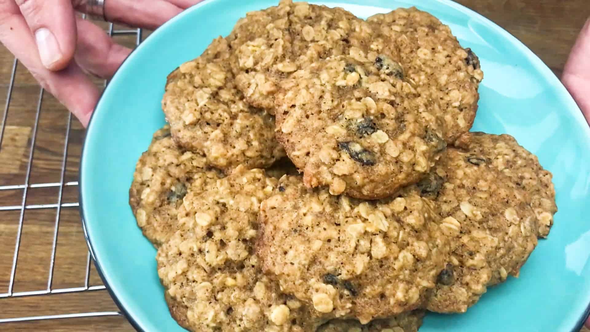 oatmeal raisin cookies served on blue plate