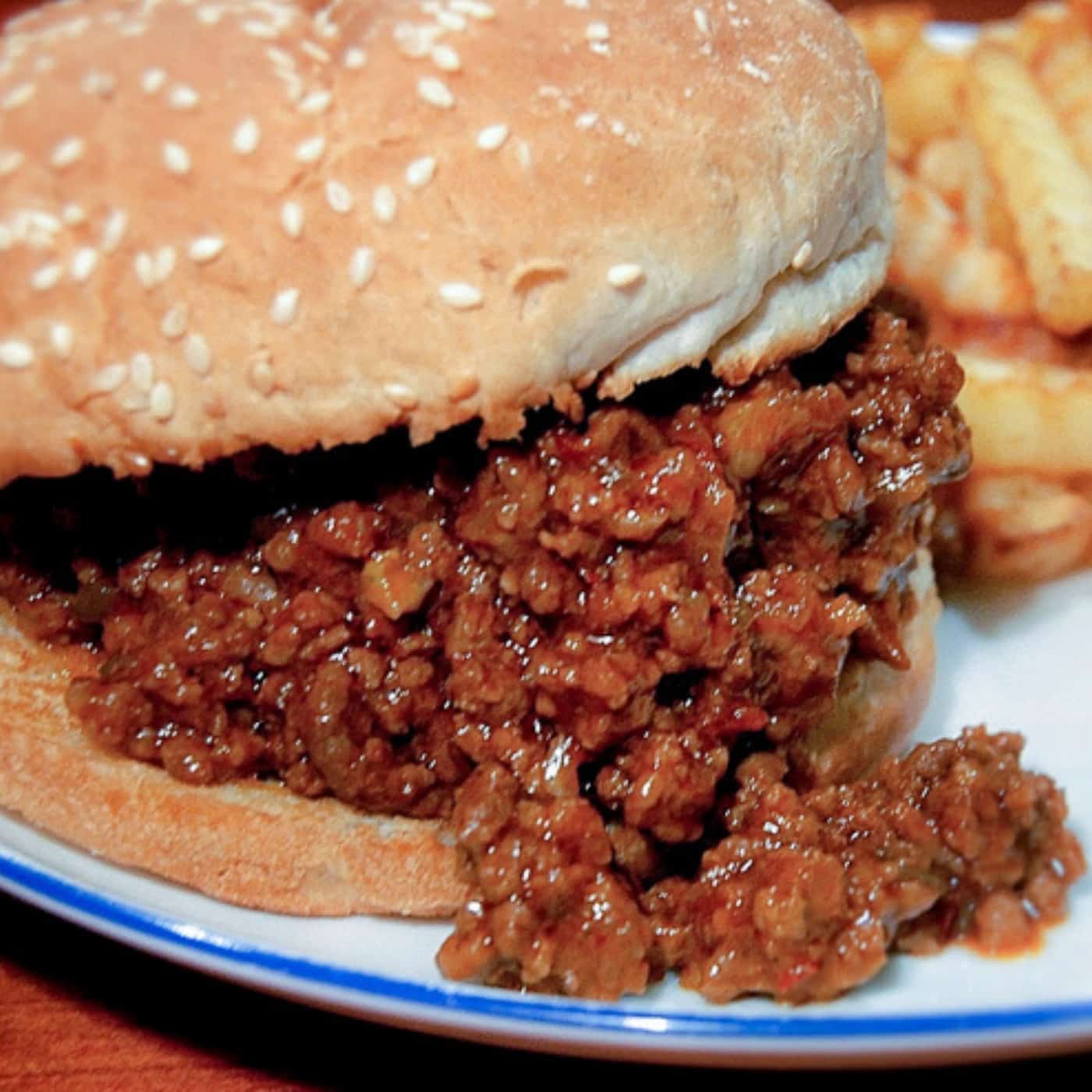 Homemade Sloppy Joe plated with French fries.