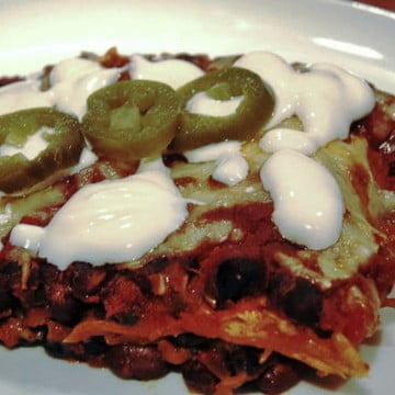 Vegetarian enchiladas with black beans and jalapeno cheese on top