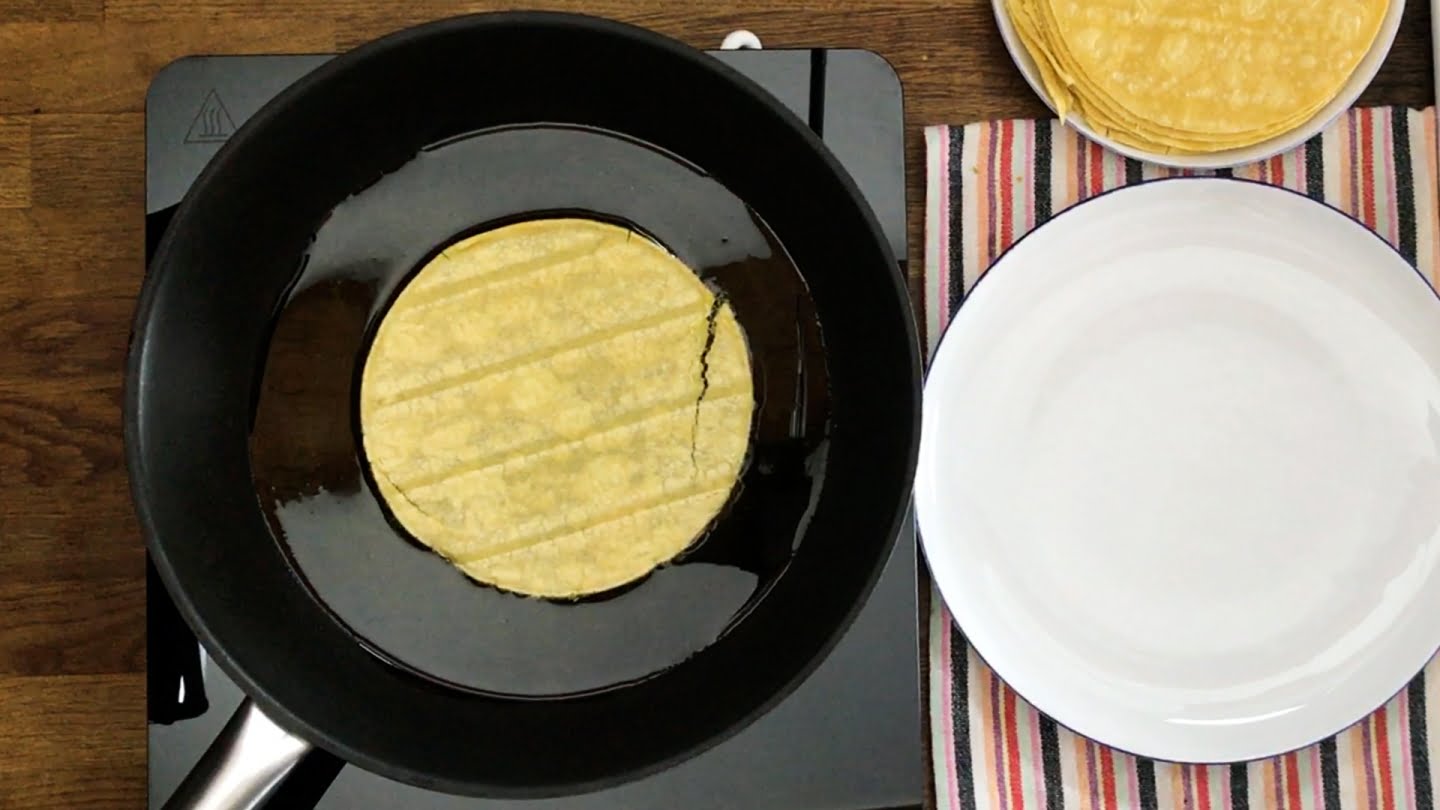 cooking tortillas in a skillet