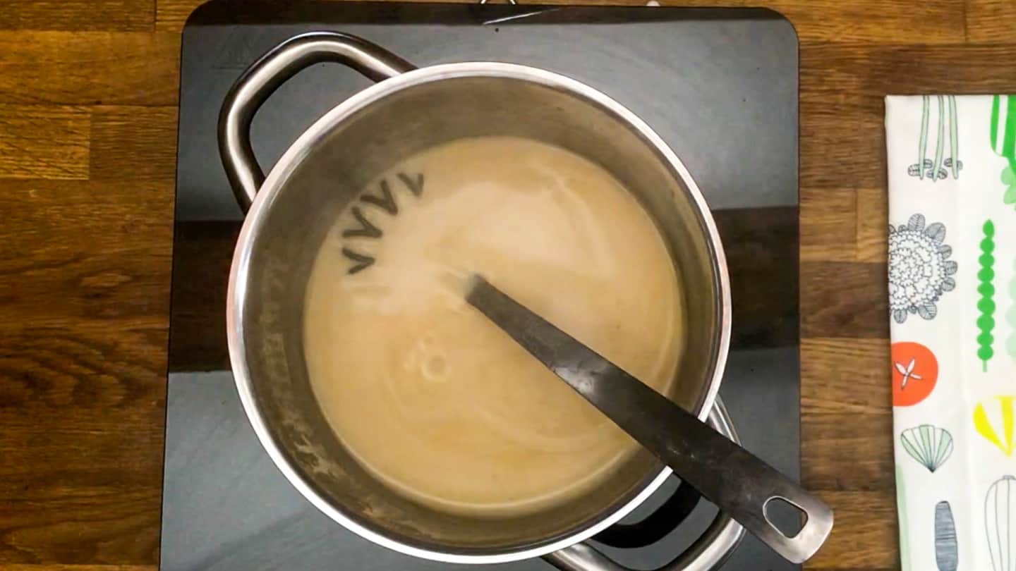 Gravy simmering, whisking occasionally until perfectly thickened