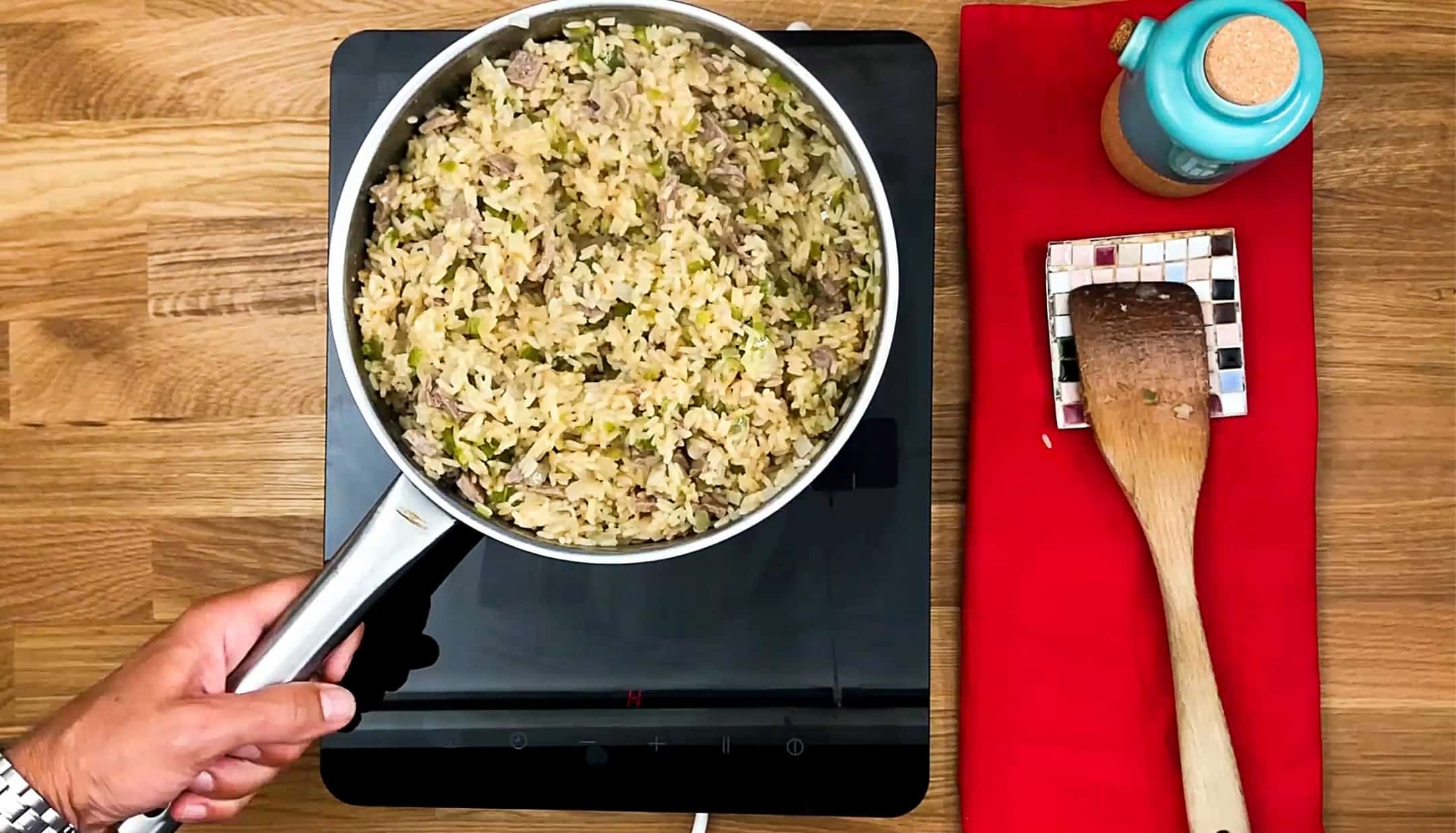 beef fried rice cook on a stove 