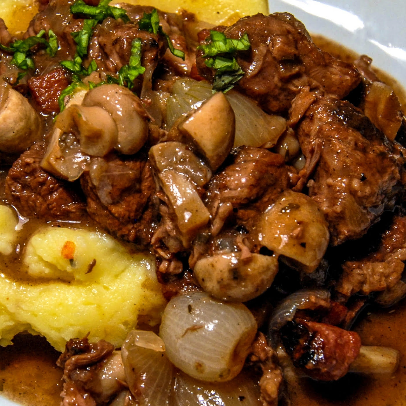 Beef Burgundy with mushrooms served with mashed potatoes
