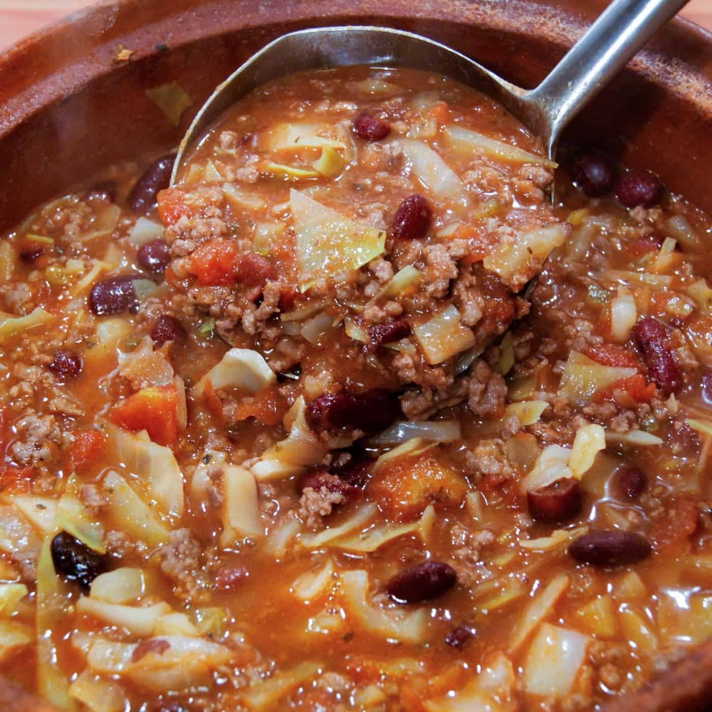 cabbage soup serve in a brown bowl