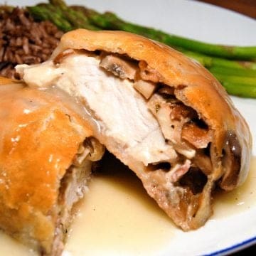 Chicken wellington served with asparagus and brown rice
