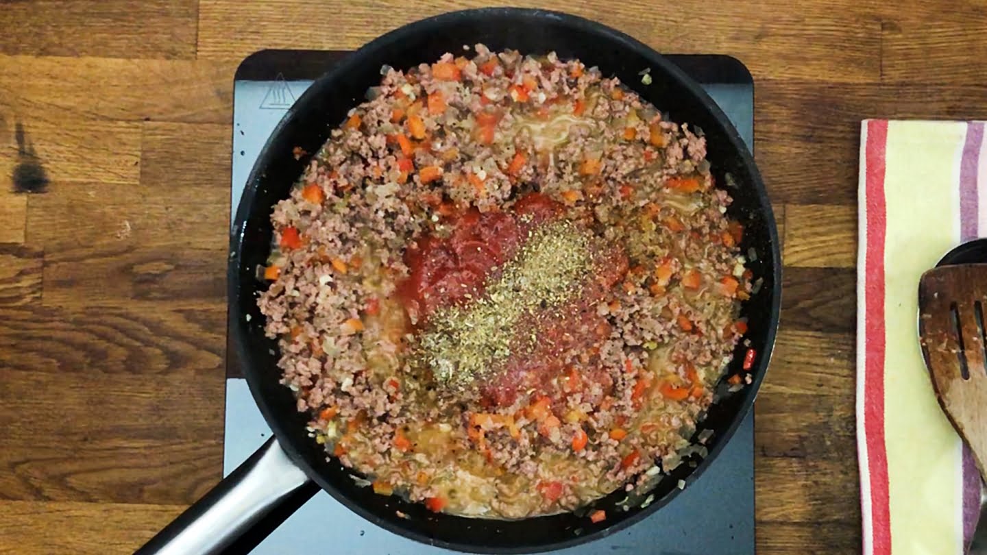 onion and peppers tomato paste with ground beef
