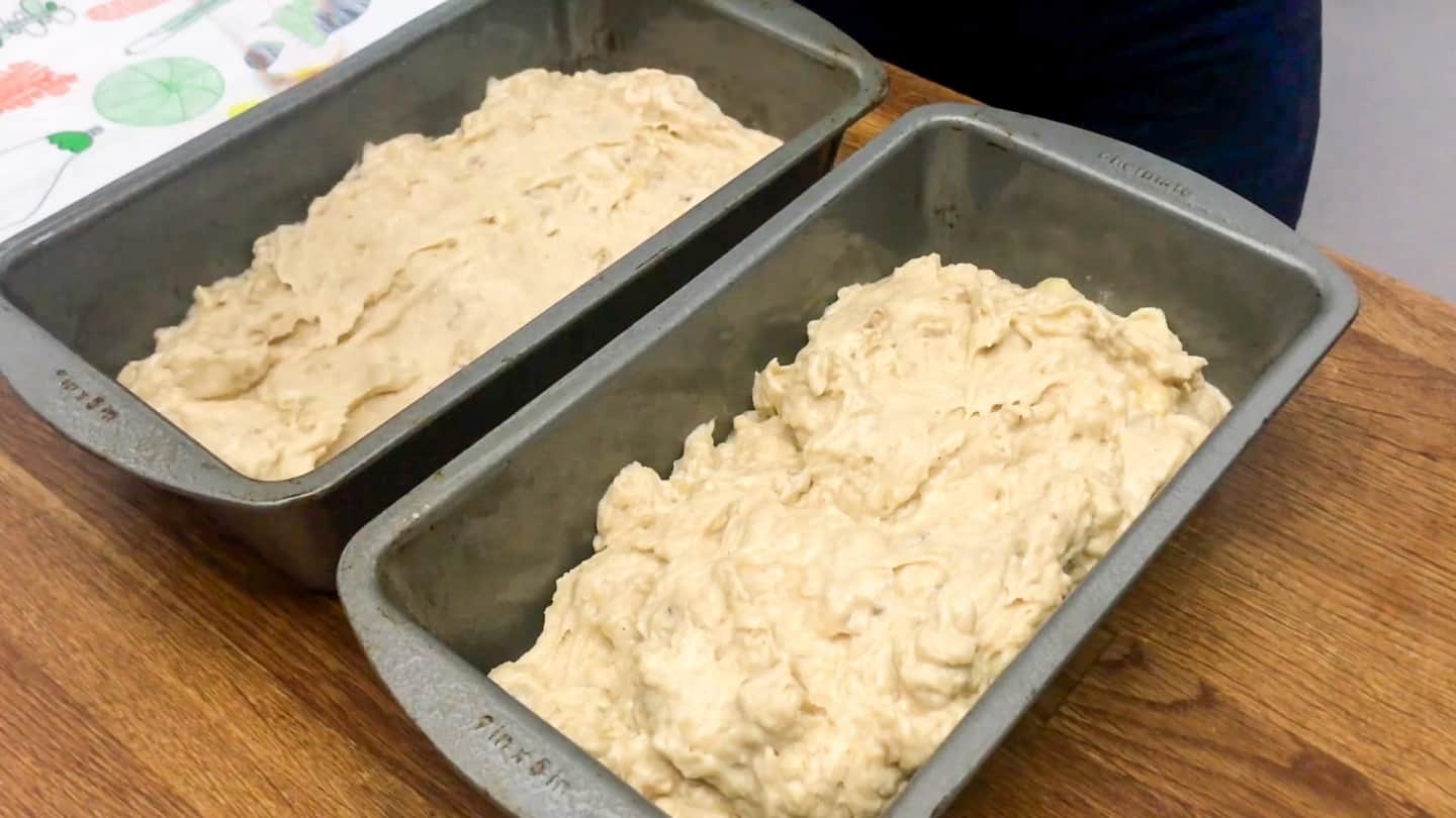 cream cheese banana bread batter into the prepared loaf pans