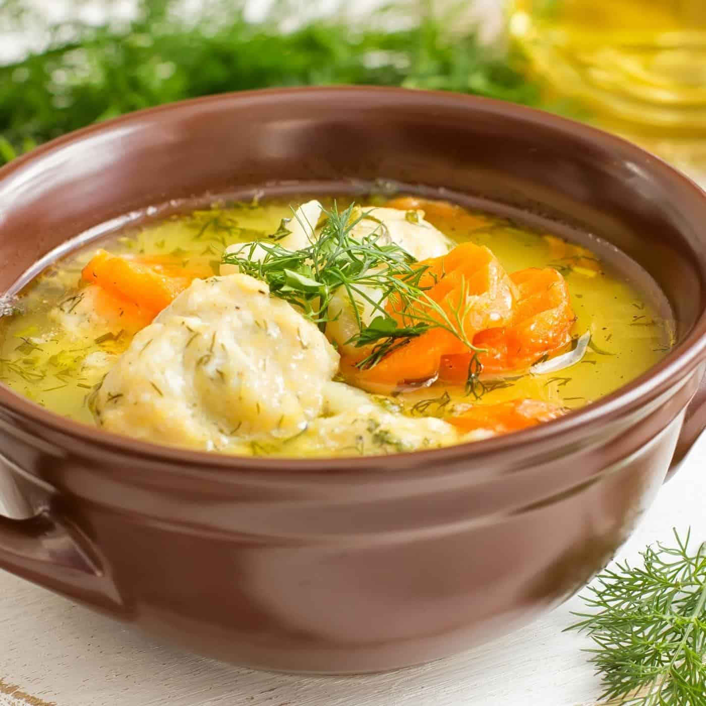 bowl of soup with vegetables and meat