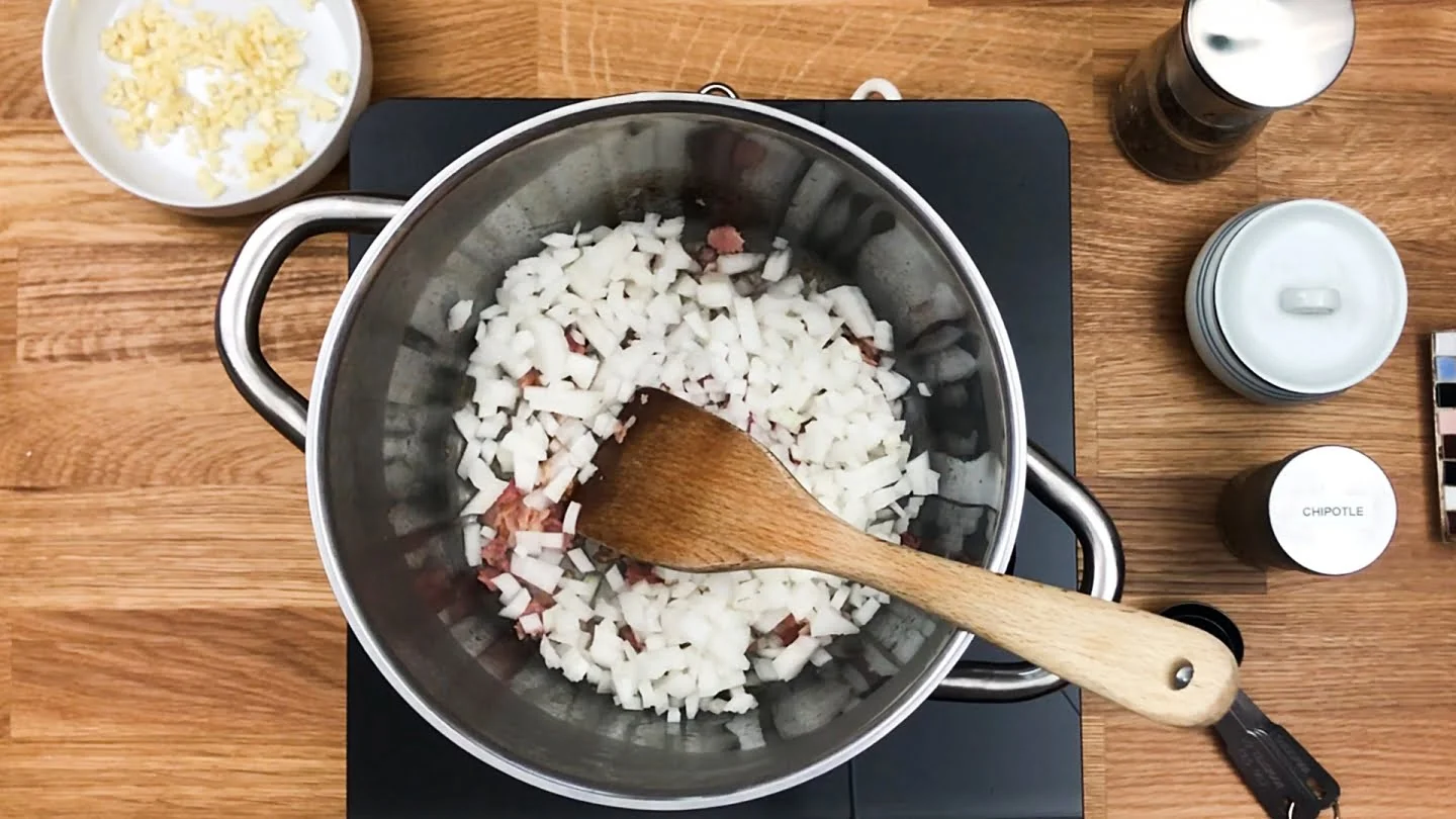 chopped onions cooking in a pot