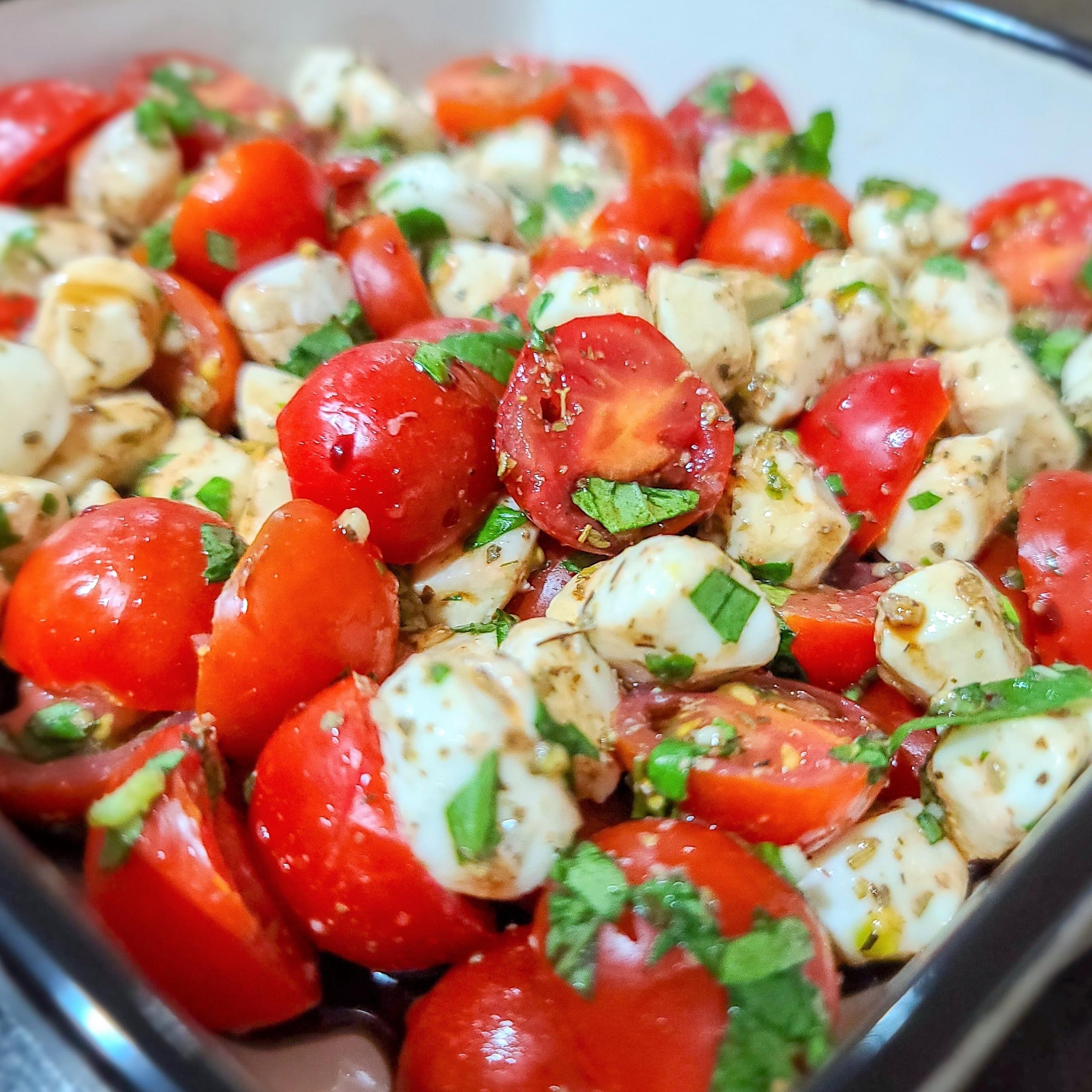 Mozzarella tomatoes basil salad