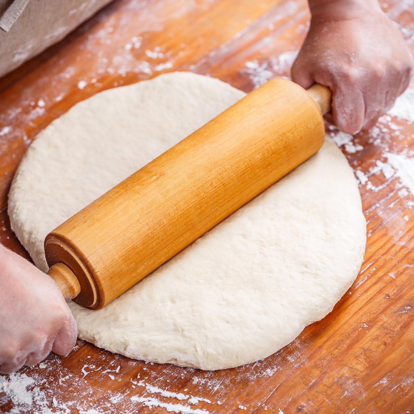 How to roll out pizza dough