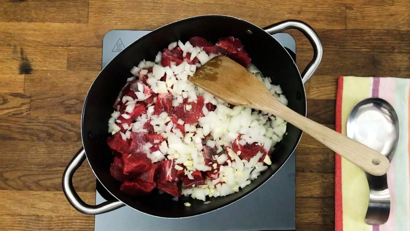 onion and garlic to the pot