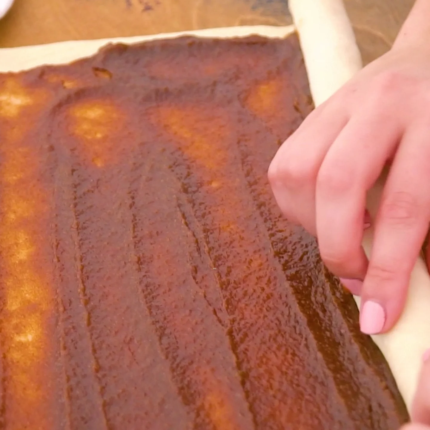 rolling the dough with mixture