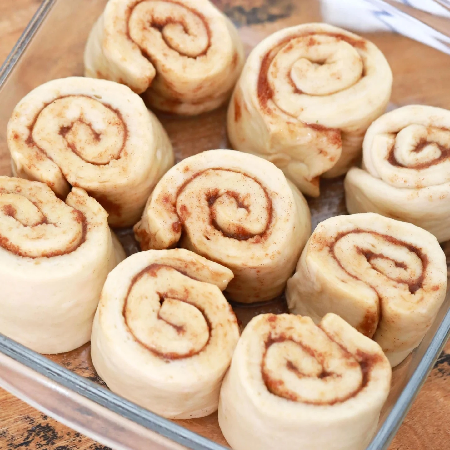 place the sliced rolls in your prepared baking dishes