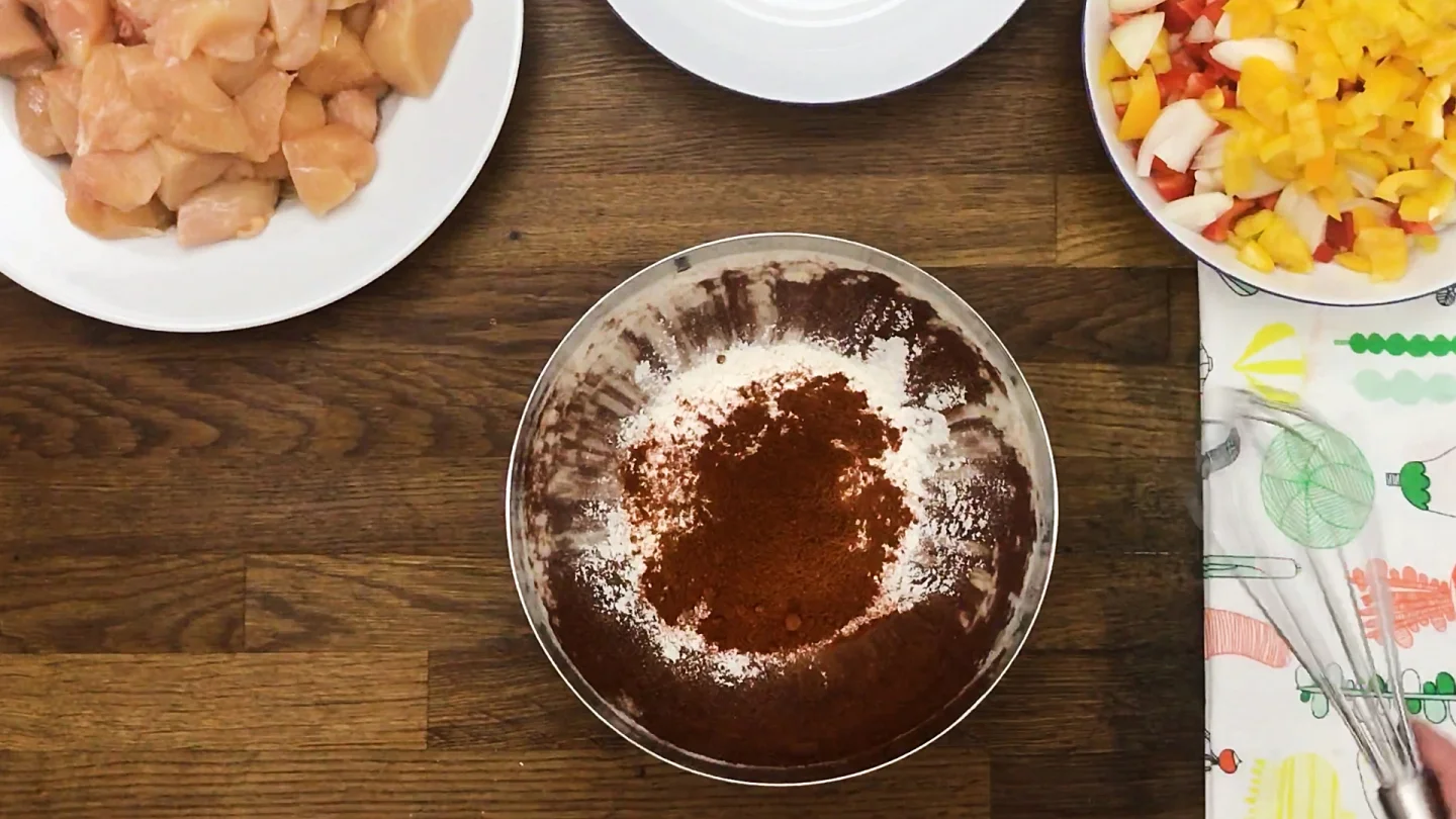 flour, 2 tablespoons paprika, salt, and freshly ground black pepper