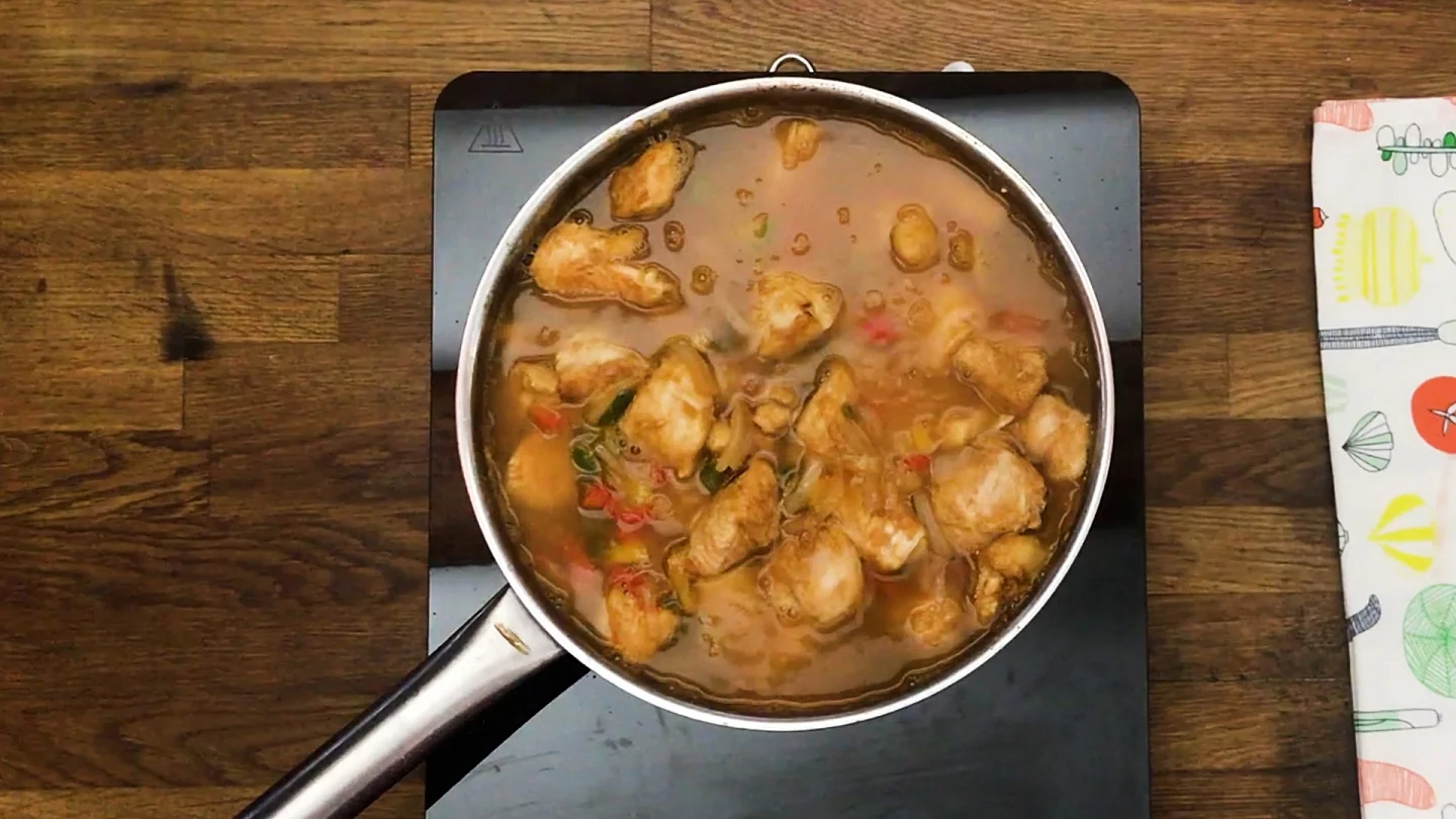 chicken to the pot and add chicken stock to cover it.