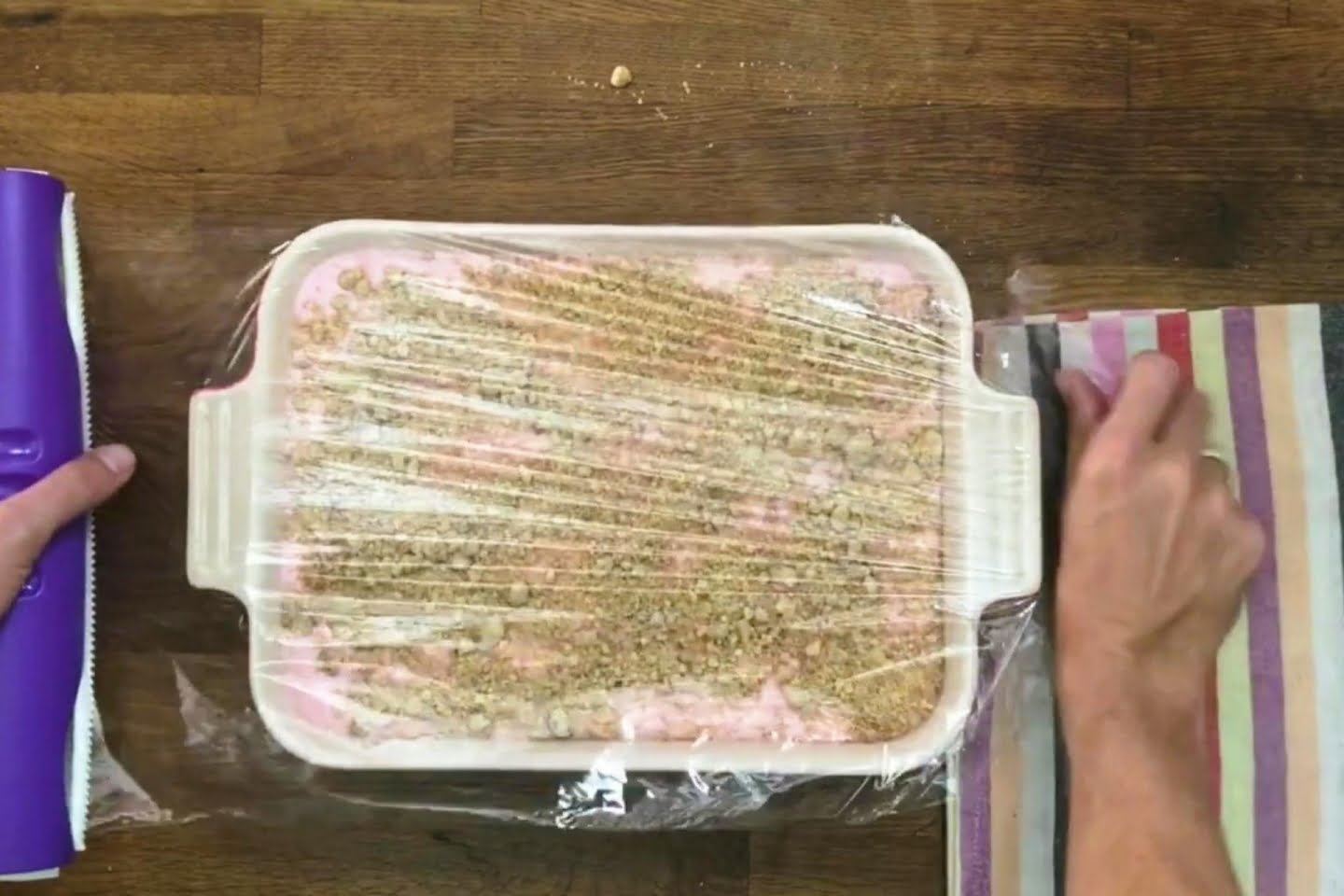 Strawberry Crumble Crunch Cake in Saran Wrap