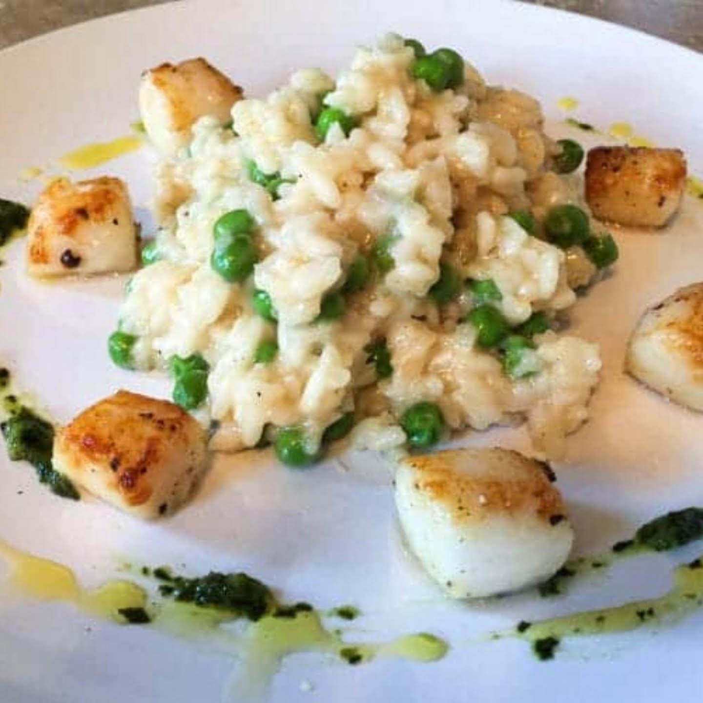 Champagne risotto with seared scallops and peas