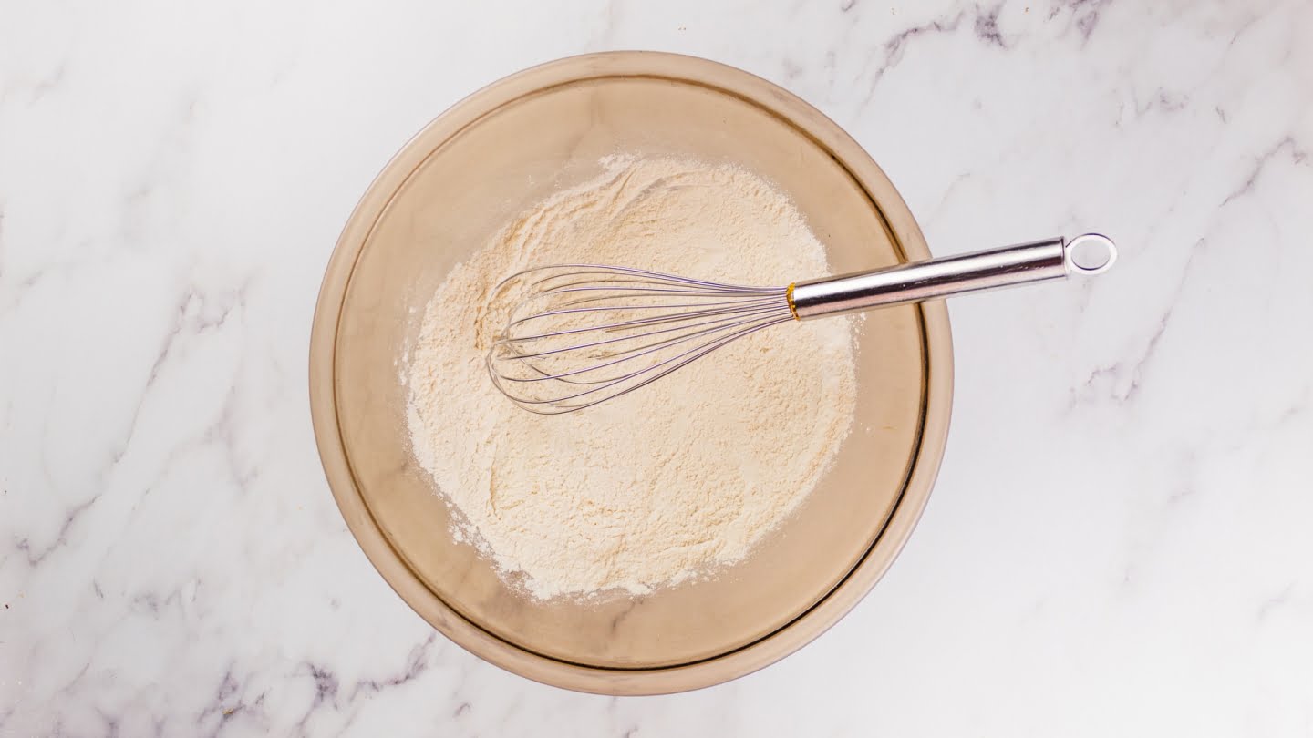 Flour, Sugar, baking powder and salt in bowl