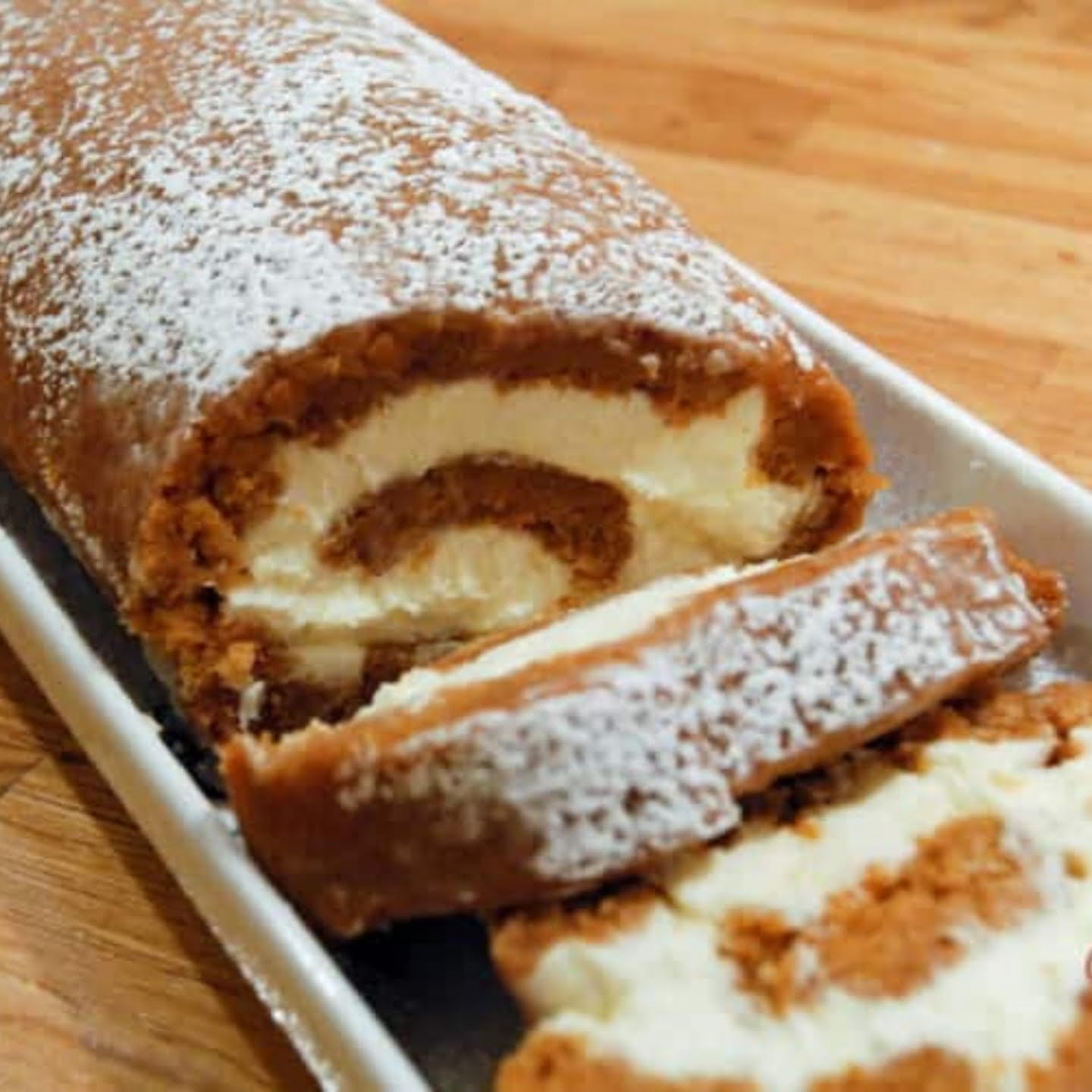SPICED PUMPKIN ROLL CAKE WITH CREAM CHEESE FILLING