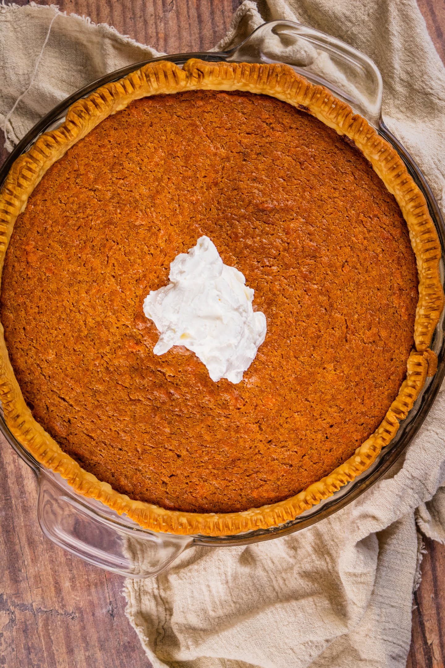 sweet potato pie serving with whipped cream