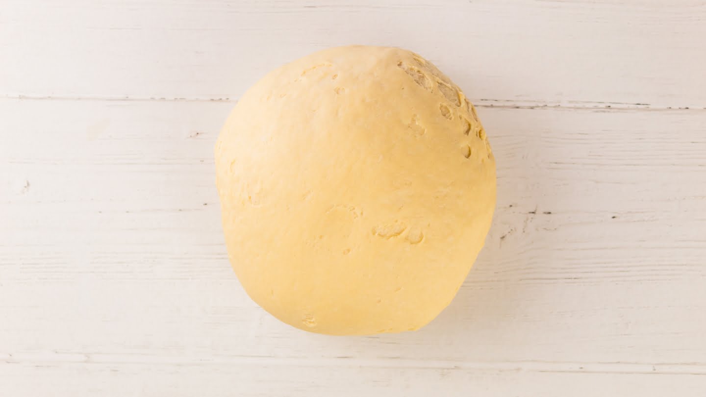  place the dough onto a floured surface and knead