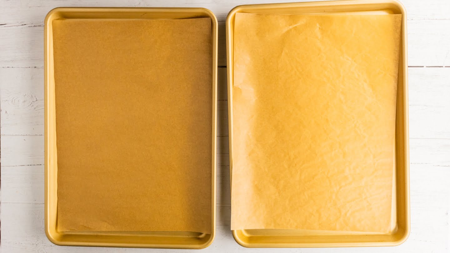 line 2 large baking sheets with parchment paper.