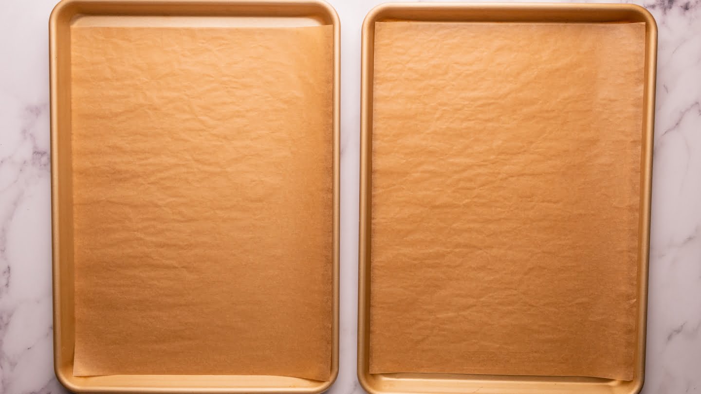 line two baking sheets with parchment paper or a silicone baking mat.