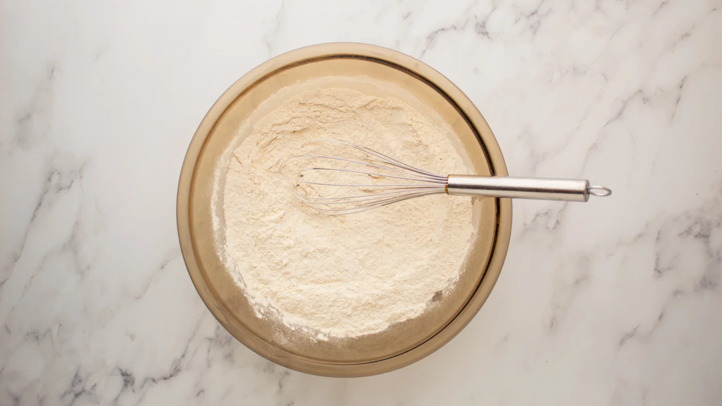 Whisk the flour, baking powder, salt, and baking soda together in a bowl