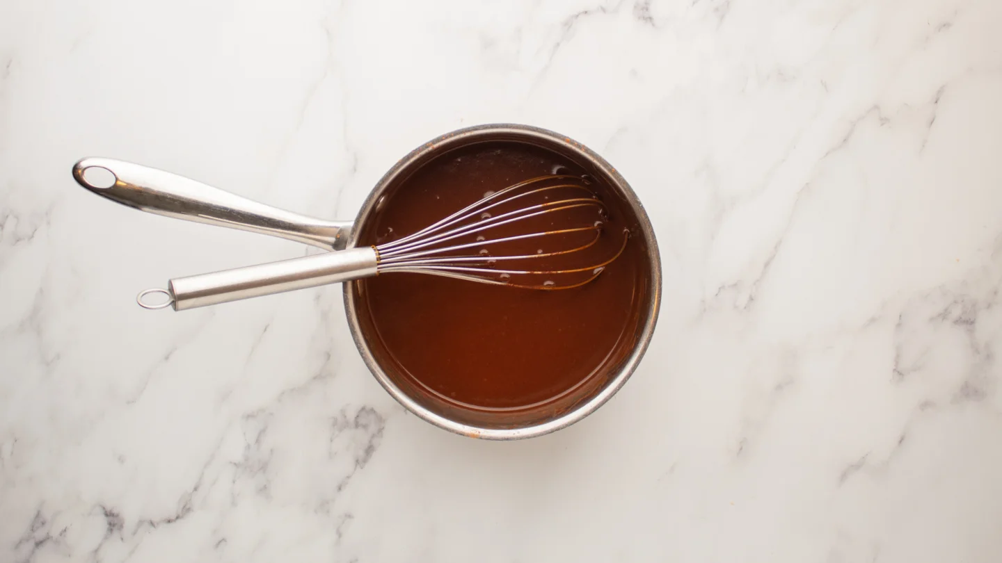 Remove the pan from the heat and stir in the butter and vanilla extract.