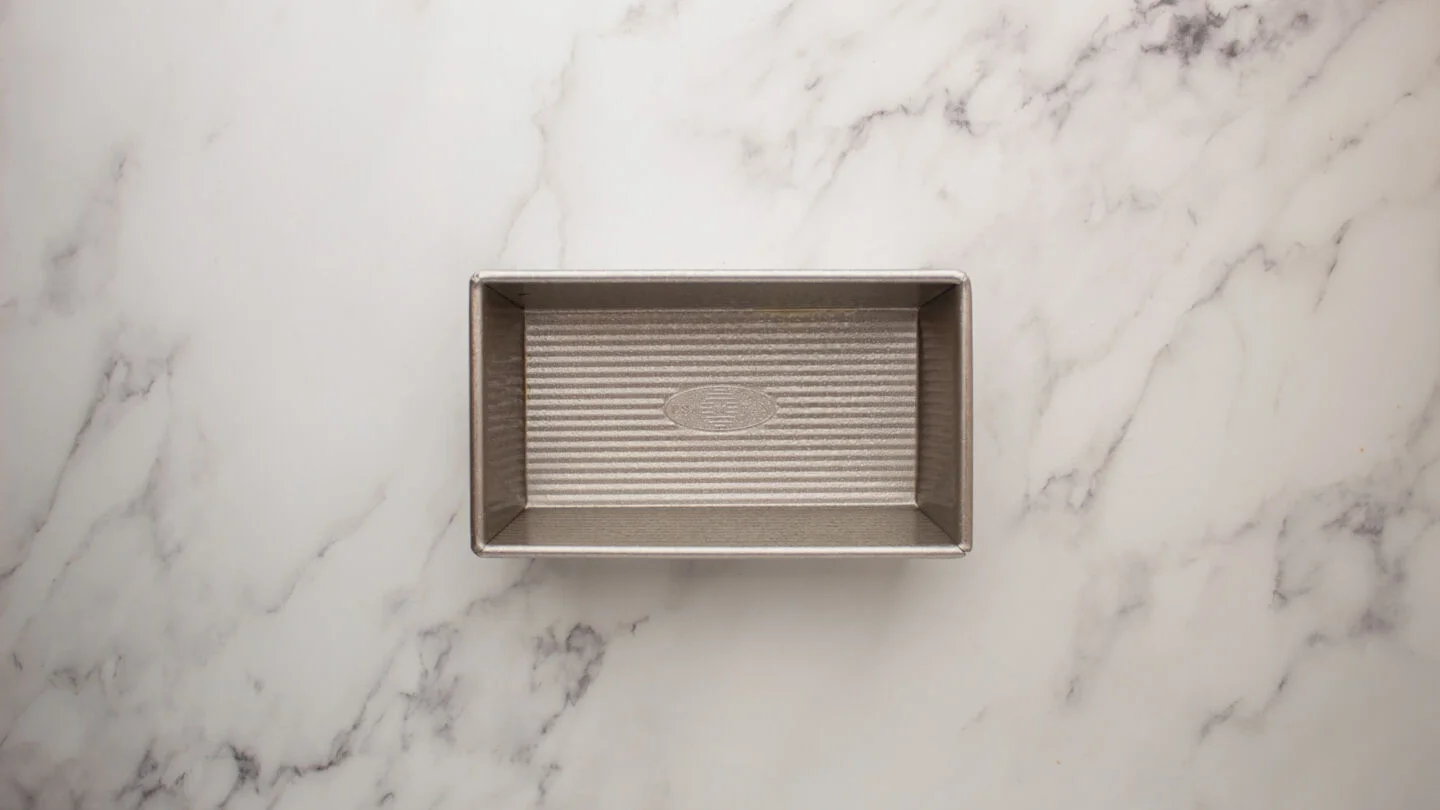 grease a loaf pan with baking spray or use parchment paper.