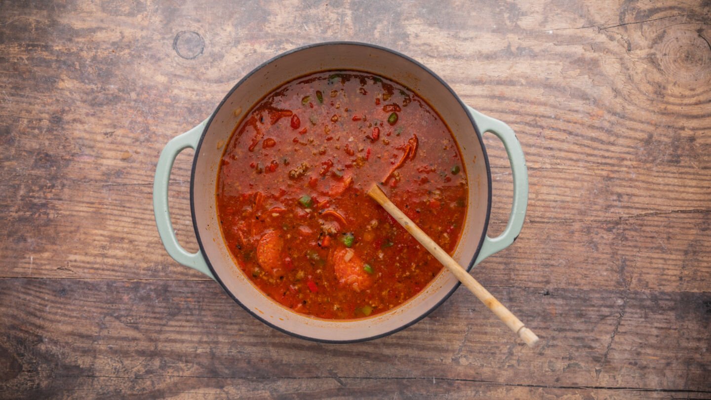 add the pepperoni, marinara sauce, fire-roasted tomatoes, and broth to the pot, stirring to combine