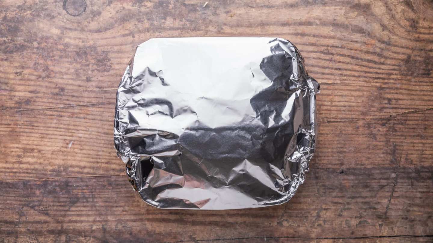 Cover the casserole dish with aluminum foil and bake in the preheated oven for 20 minutes