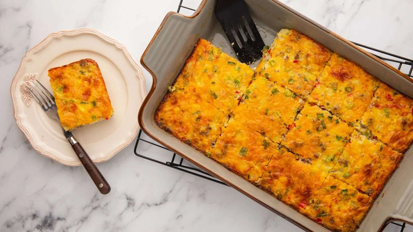 Remove the baked casserole from the oven and let it rest for 10 minutes before slicing it into squares and serving