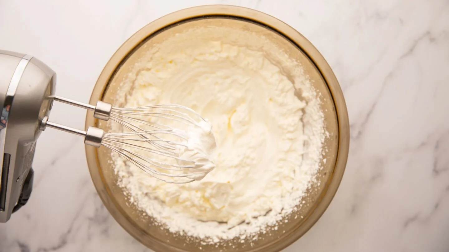Add the whipping cream to a mixing bowl and beat 