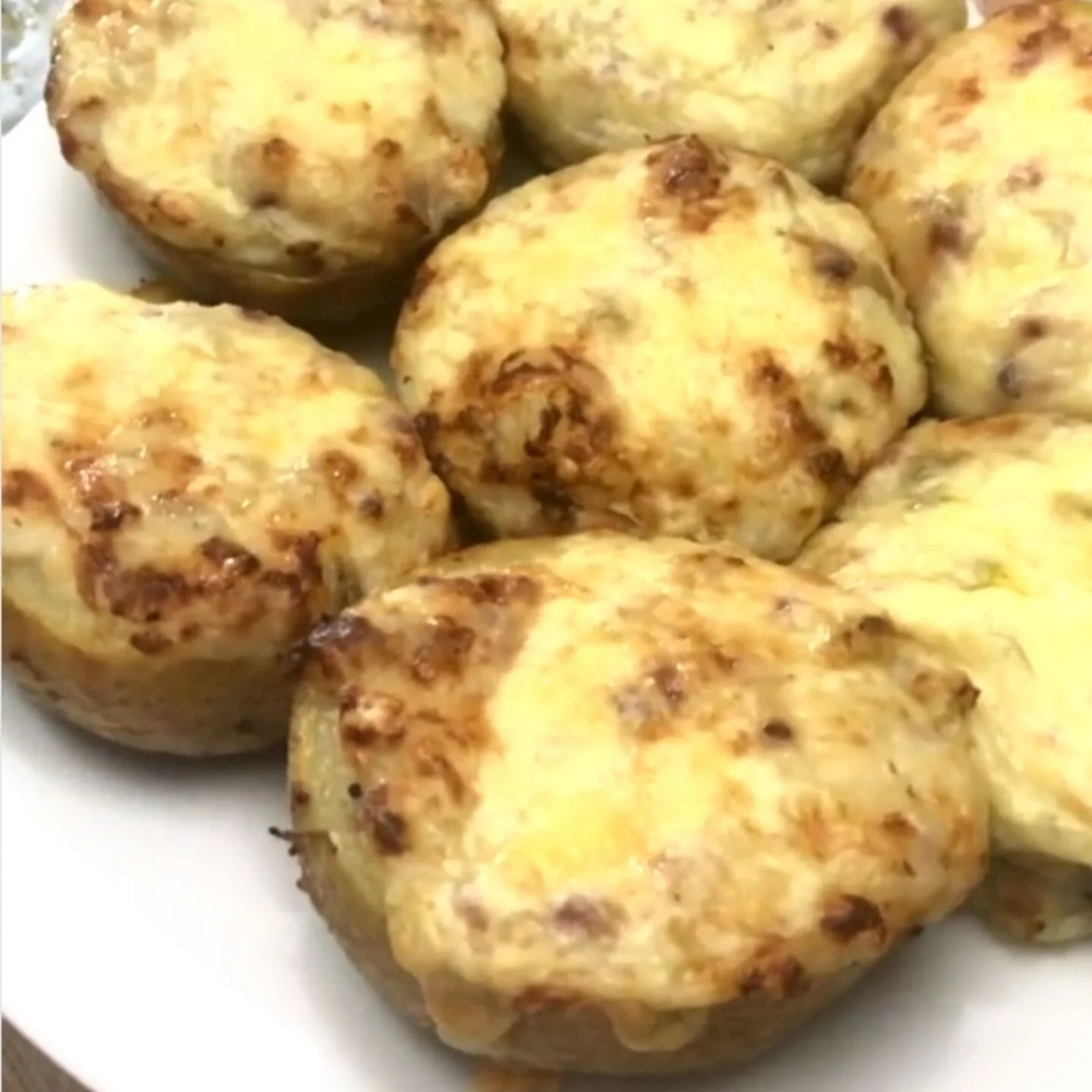 Put the potato halves on a baking sheet and bake
