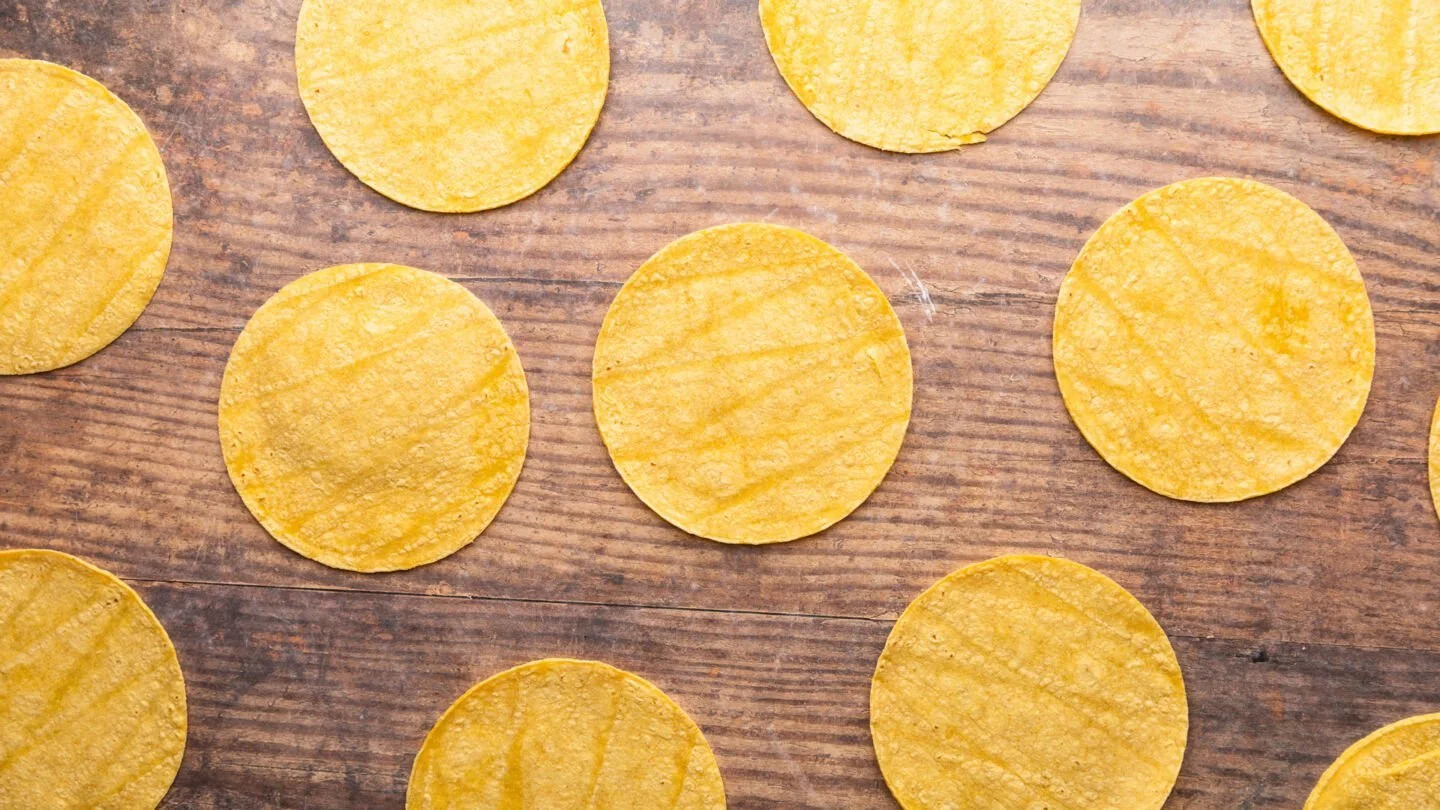 Step 3 Transfer the taco meat to a bowl and lay the corn tortillas on a clean surface.